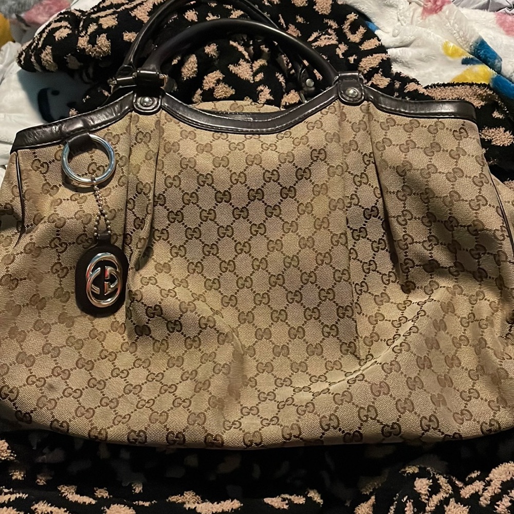 Authentic Gucci large monogram Sukey bag